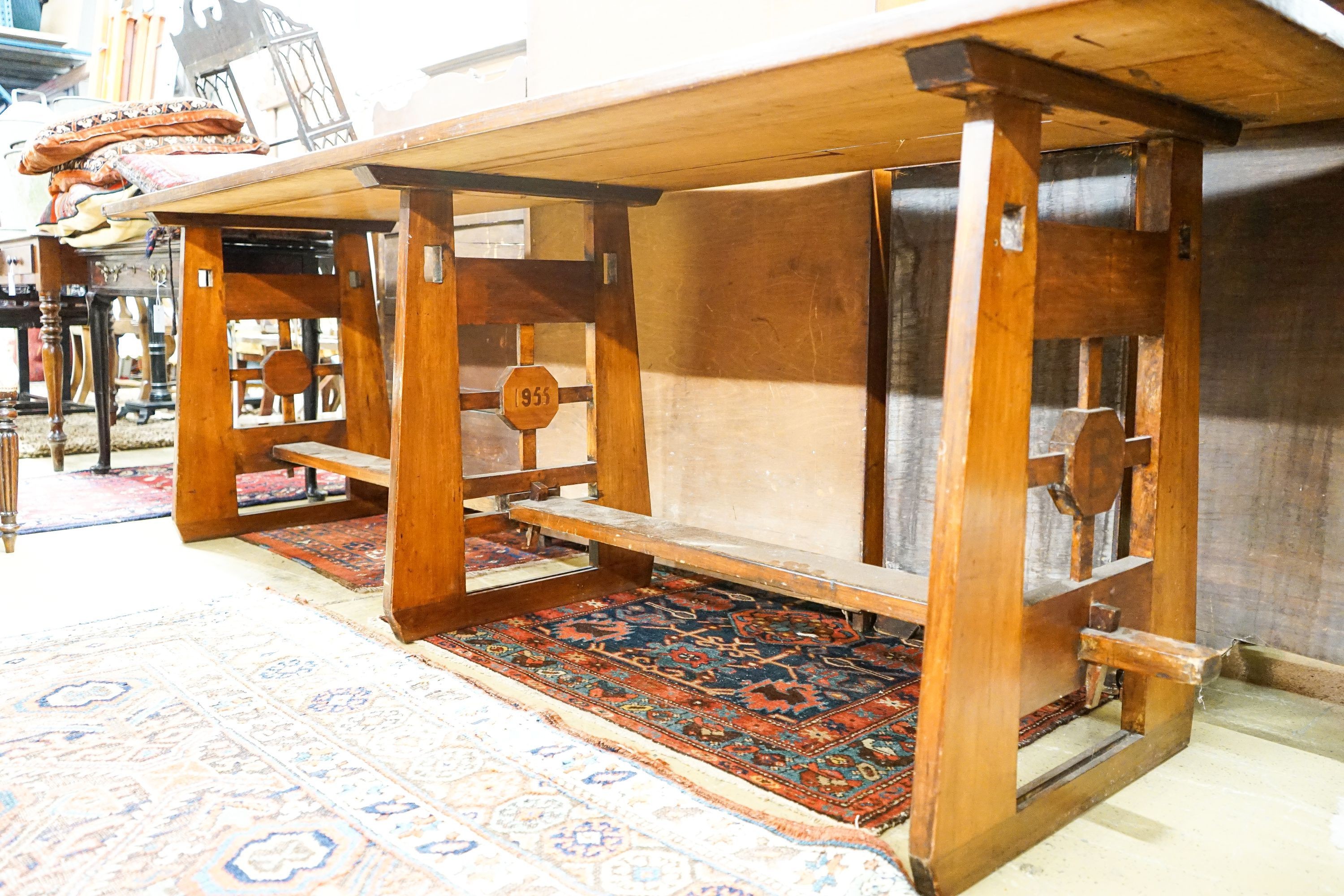 A mid 20th century Arts and Crafts style rectangular pine and beech serving table, dated 1955, length 245cm, depth 66cm, height 76cm